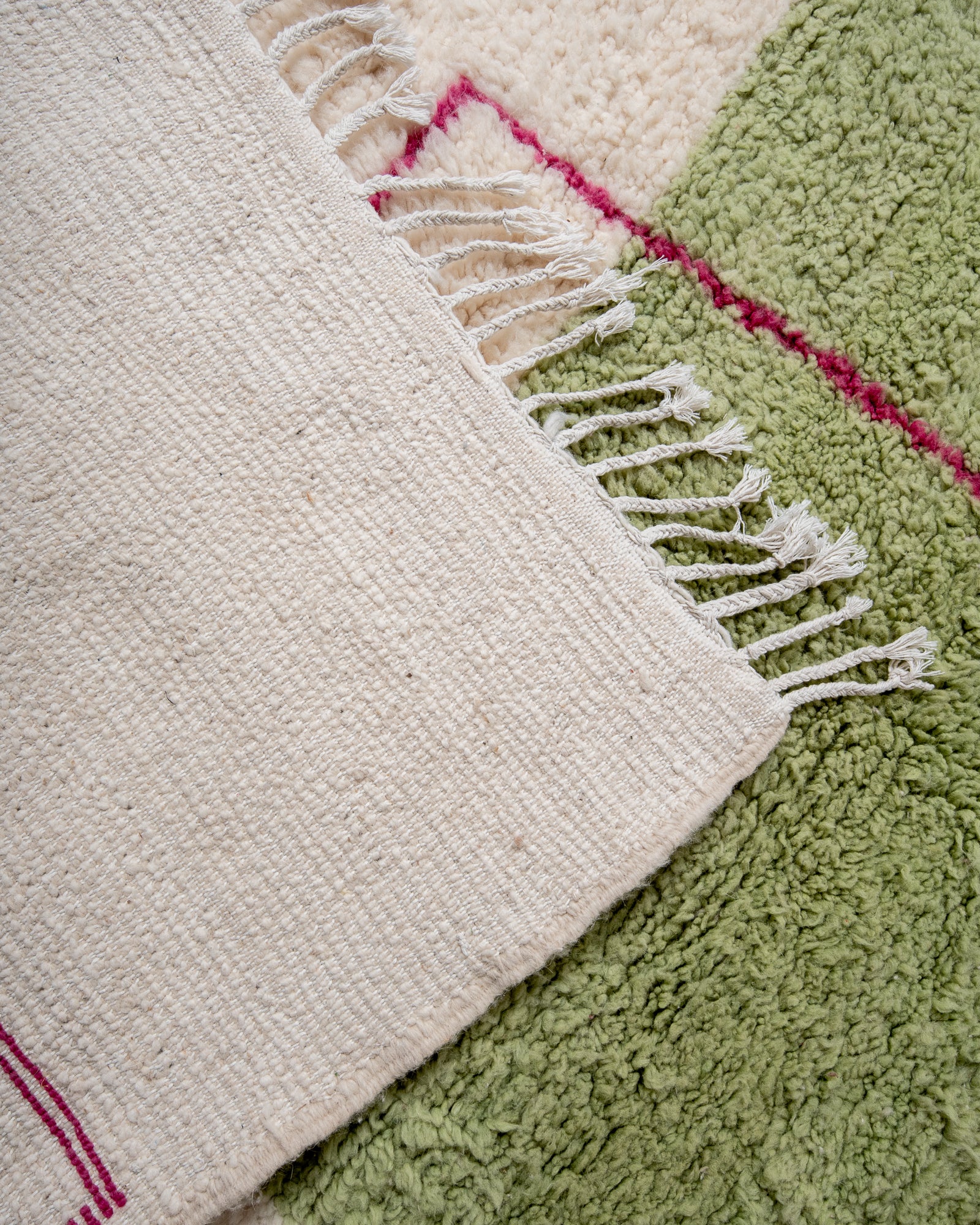 Modern, designer, handcrafted Berber rug from Morocco. Beniourain carpet with beautiful colours and patterns and fluffy wool texture.